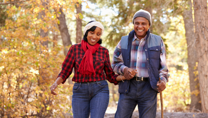 Couple enjoying hike in woods