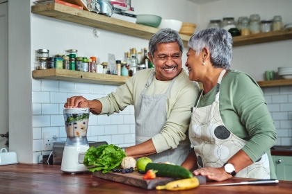 Couple making a smoothie together