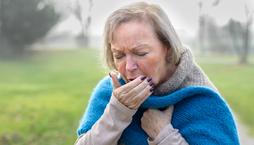 Woman coughing