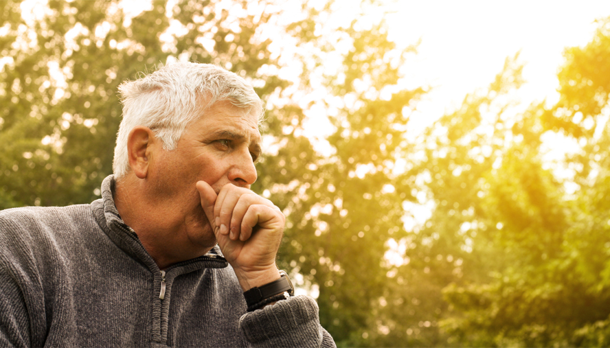 Man coughing in the fall