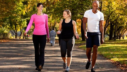 Three people enjoying a walk