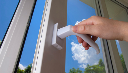 holding handle on a glass door