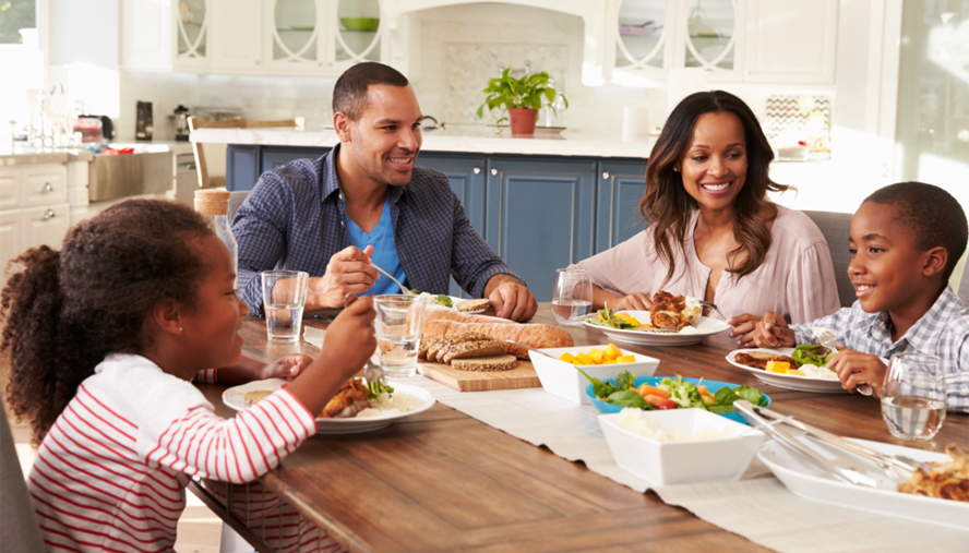 Family enjoying breakfast together