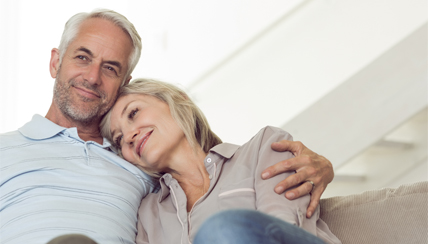 Healthy senior couple embracing