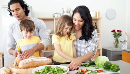 family making a meal together