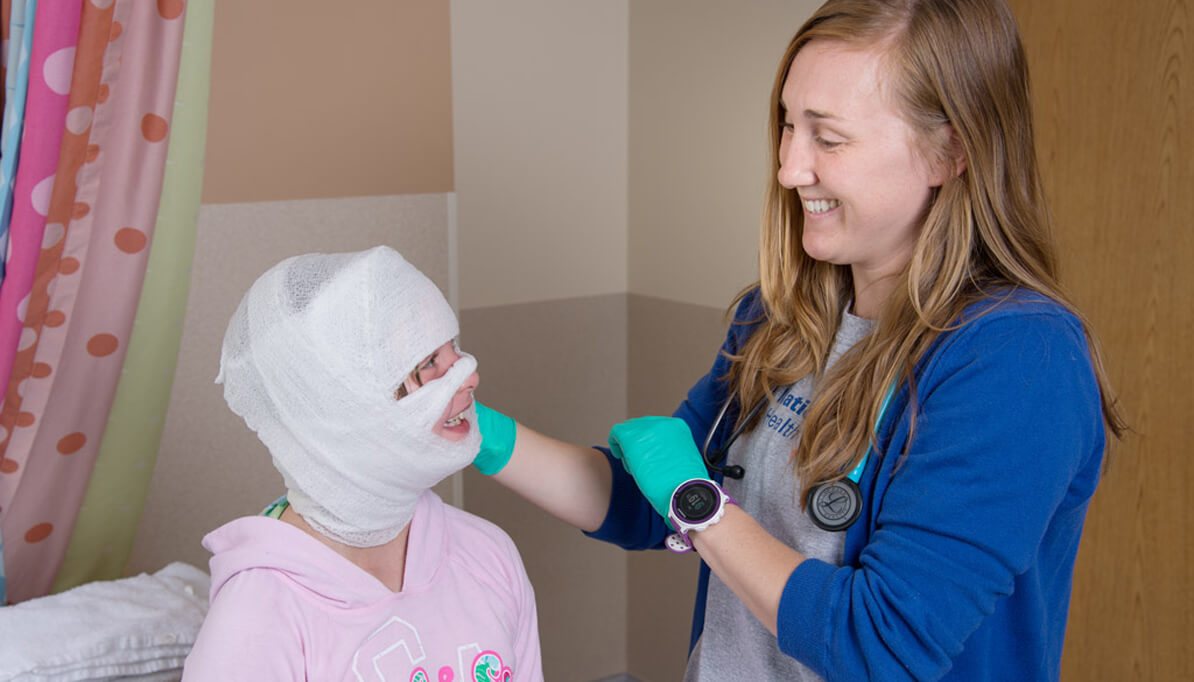 Nurse with pediatric patient