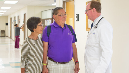 patients talking with a doctor