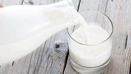 Pouring milk in a glass