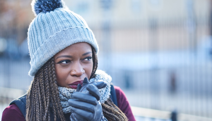 Woman standing outside in the cold