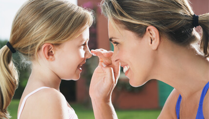 woman talking to her daughter