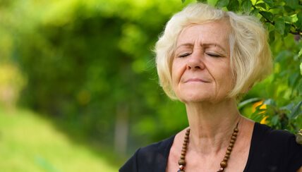 Woman Using Airway Clearance Techniques